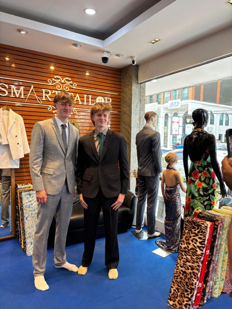 Customers in bespoke suits at SMART TAILOR Lagoon Road