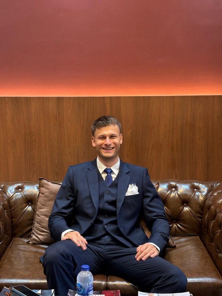 Customer in bespoke three-piece suit at SMART TAILOR Nai Yang